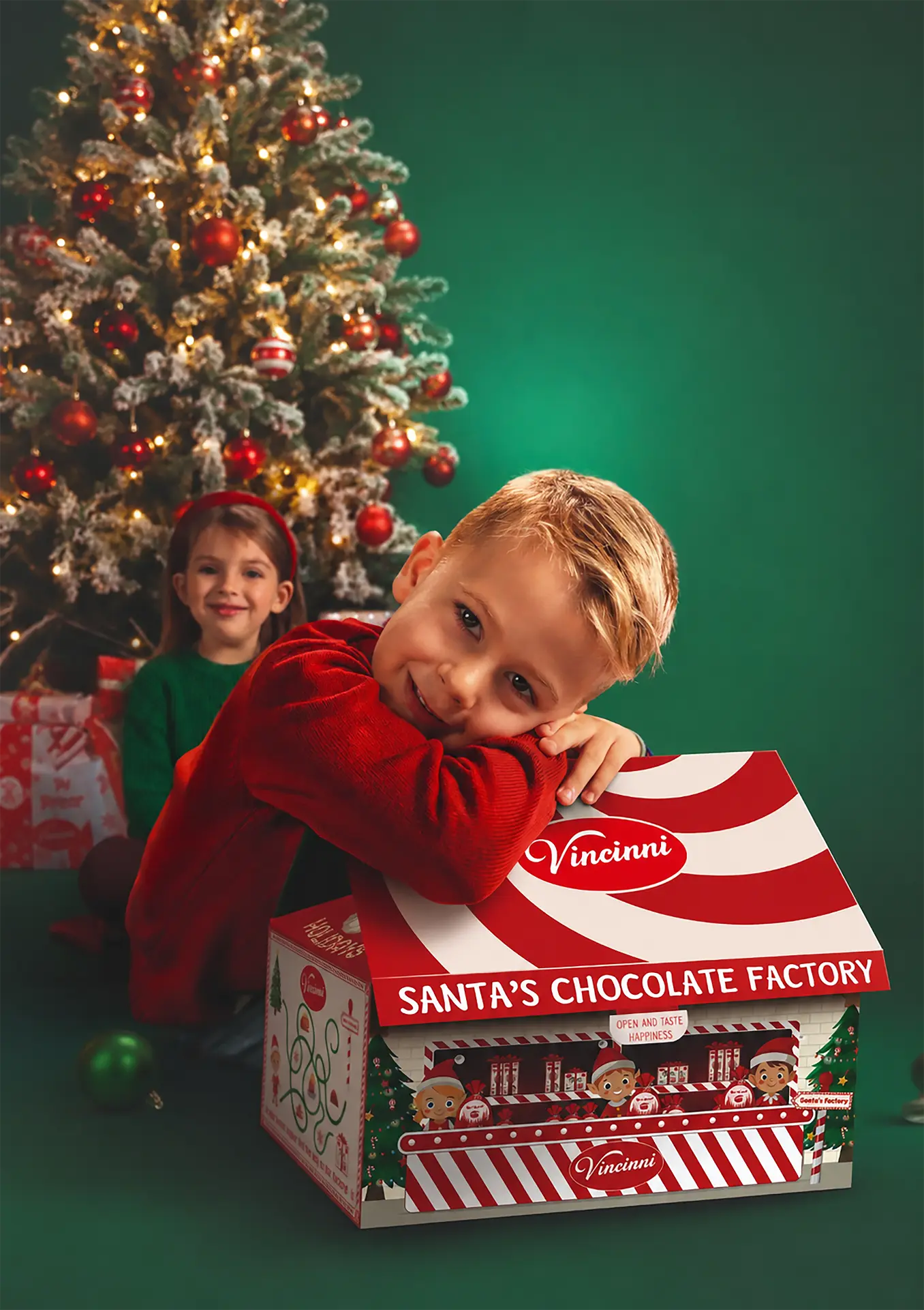 Child hugging the Santa's Chocolate Factory gift box